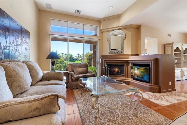 living room featuring a towering ceiling