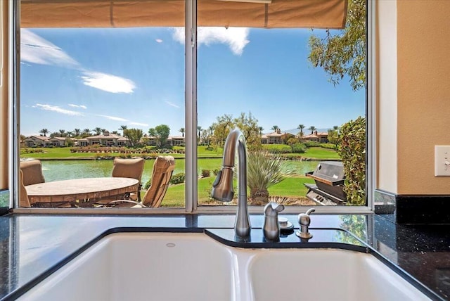 details with sink and a water view