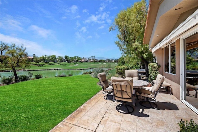 view of patio / terrace with a water view