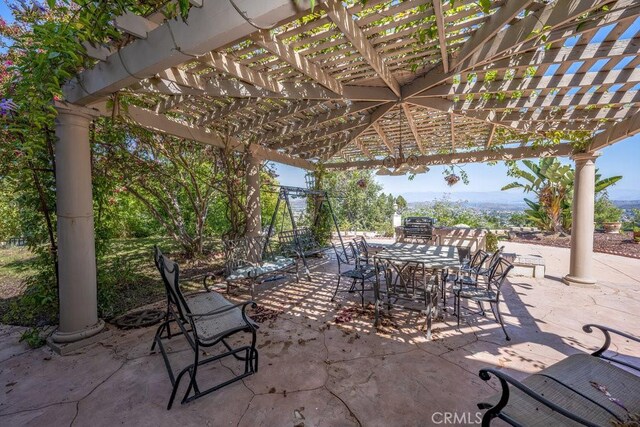 view of patio / terrace featuring a pergola