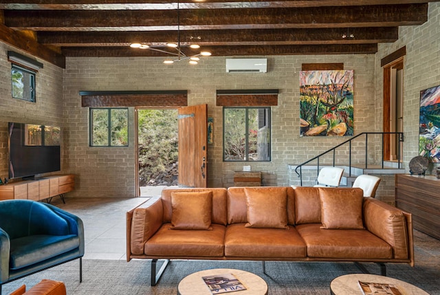 tiled living room with brick wall, beamed ceiling, plenty of natural light, and a wall mounted air conditioner