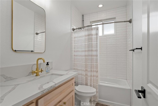 full bathroom featuring vanity, toilet, and shower / bathtub combination with curtain