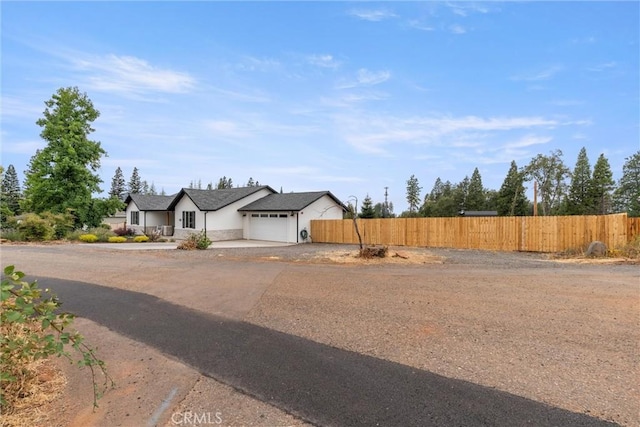 view of front of property with a garage