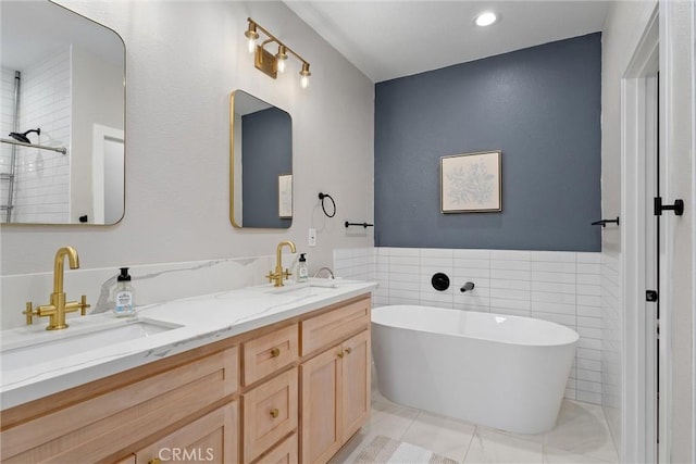 bathroom with tile patterned floors, plus walk in shower, vanity, and tile walls