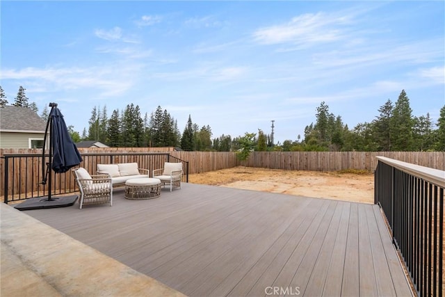 wooden deck with outdoor lounge area