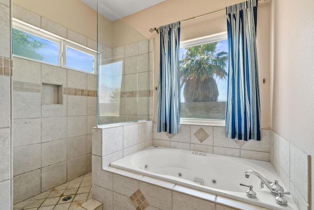 bathroom with separate shower and tub