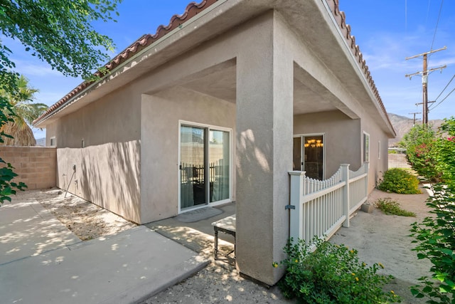 view of home's exterior with a patio