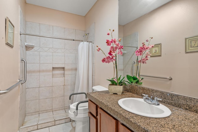 bathroom featuring tile patterned floors, a shower with shower curtain, vanity, and toilet