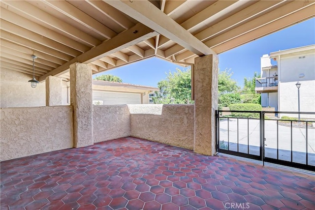 view of patio / terrace with a balcony