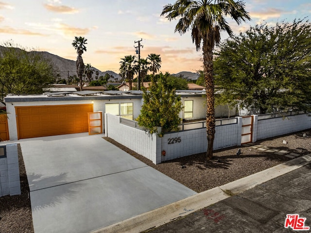 view of front of home with a mountain view