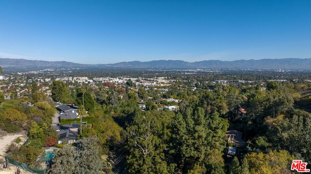 drone / aerial view featuring a mountain view