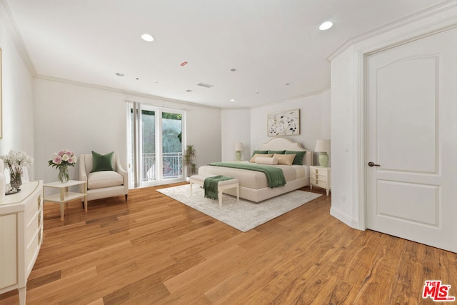 bedroom with ornamental molding, light hardwood / wood-style flooring, and access to exterior