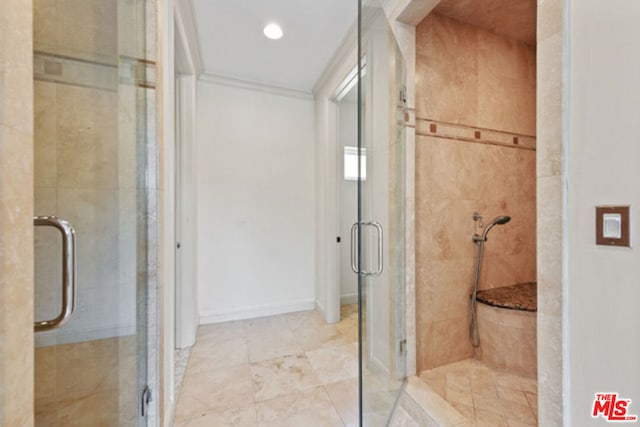 bathroom with a shower with shower door