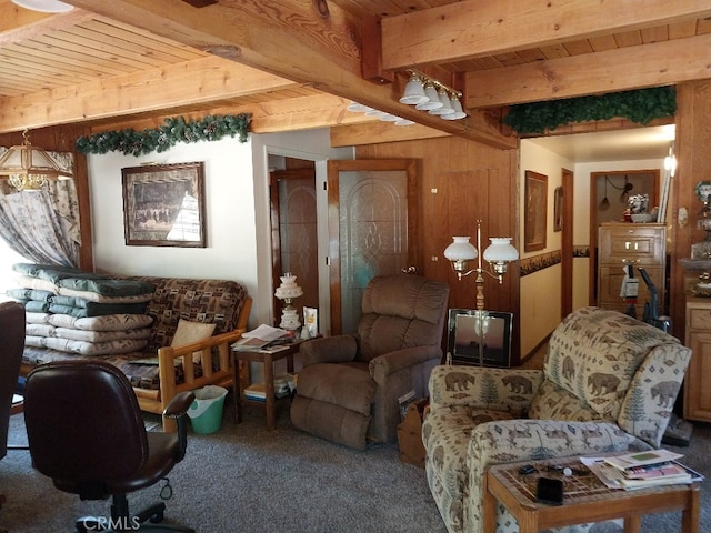 sitting room featuring carpet flooring, wood ceiling, and beam ceiling