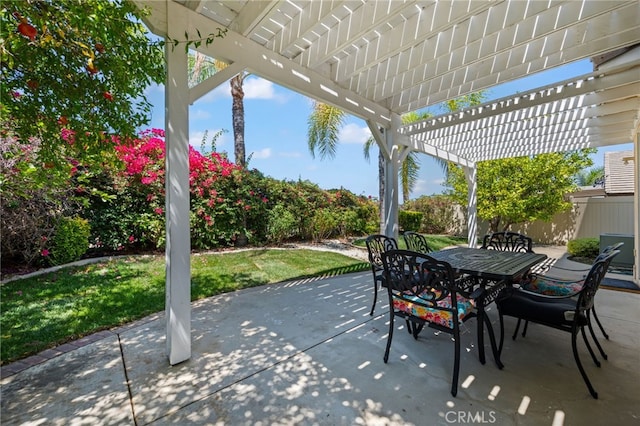 view of patio / terrace with outdoor dining space, fence, and a pergola