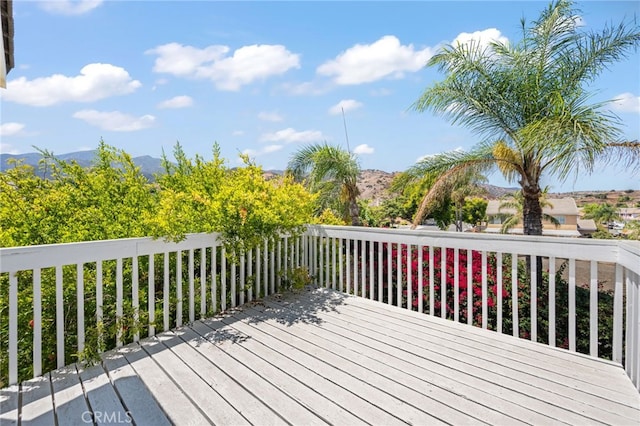 wooden terrace featuring a mountain view