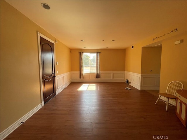 empty room featuring dark hardwood / wood-style floors