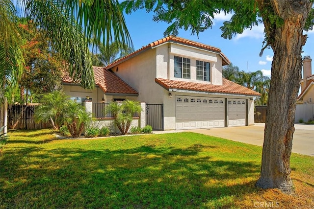 mediterranean / spanish-style house with a front lawn and a garage