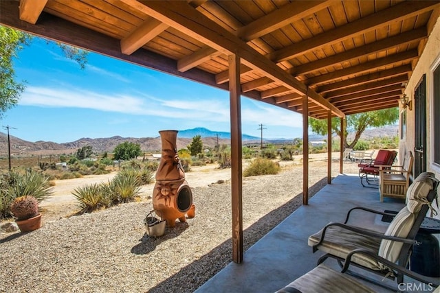 view of patio with a mountain view