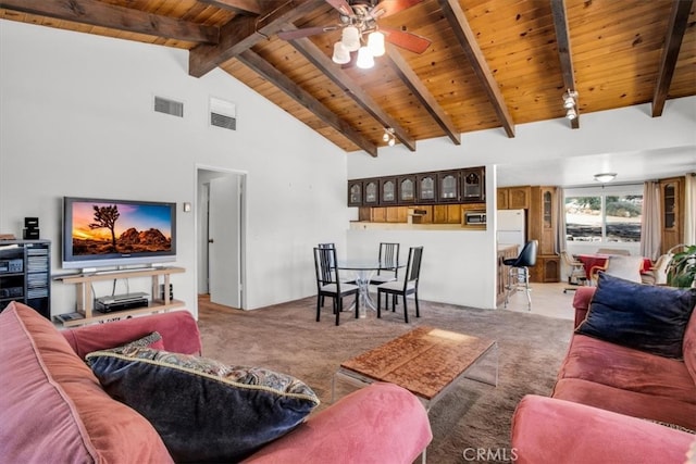 living room featuring light carpet, high vaulted ceiling, beam ceiling, and ceiling fan