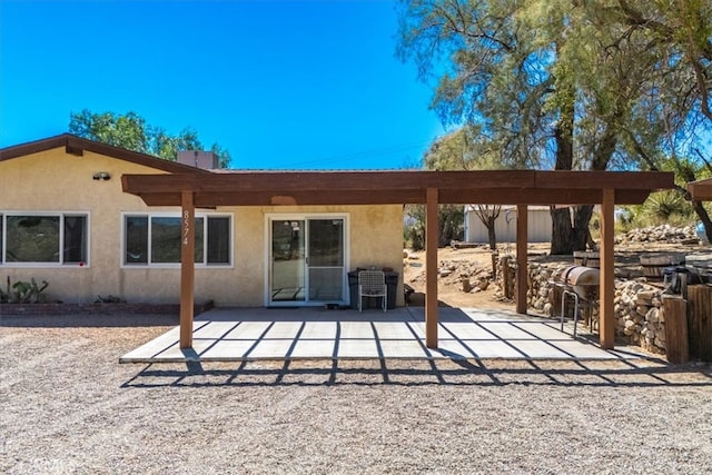 rear view of house with a patio area