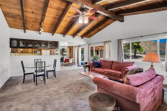 carpeted living room featuring ceiling fan, high vaulted ceiling, beamed ceiling, and wooden ceiling