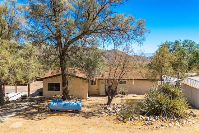 exterior space featuring a mountain view