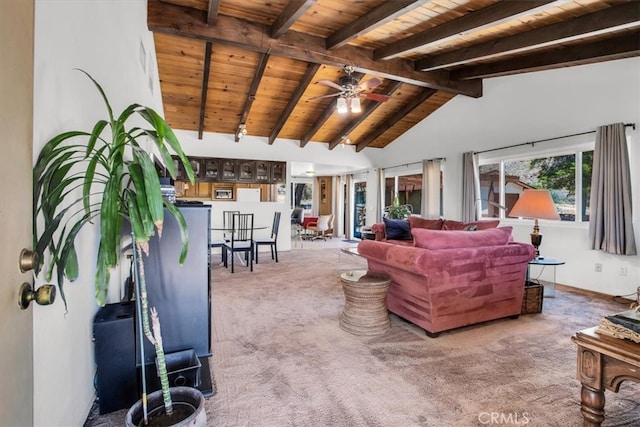 carpeted living room featuring wood ceiling, lofted ceiling with beams, and ceiling fan