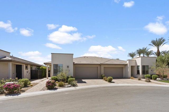 view of front of property featuring a garage