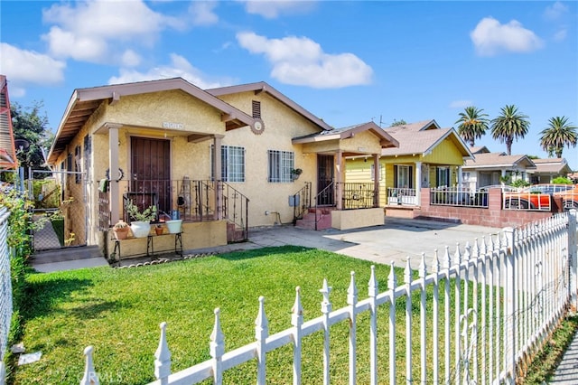 view of front of property with a front lawn