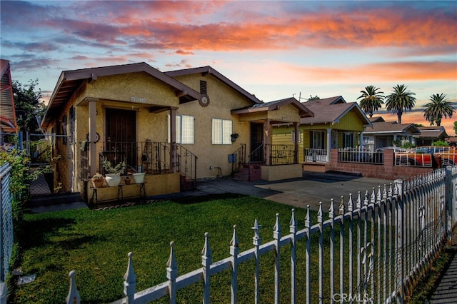 view of front of home featuring a yard