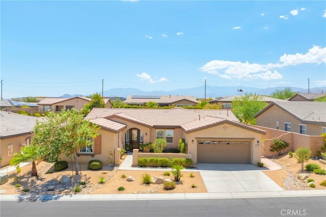 ranch-style home with a garage