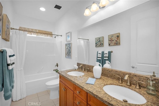 full bathroom featuring vanity, toilet, tile patterned floors, and shower / tub combo with curtain