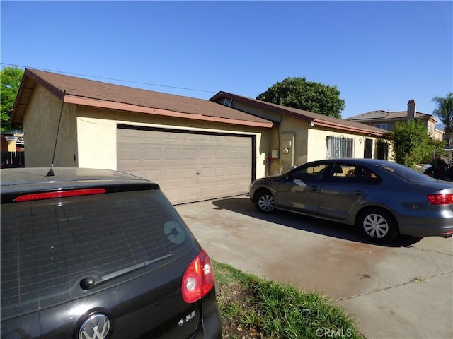 exterior space with a garage