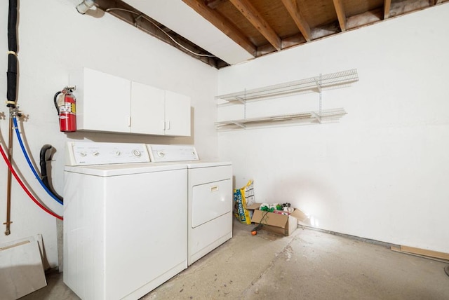 laundry room featuring washer and clothes dryer