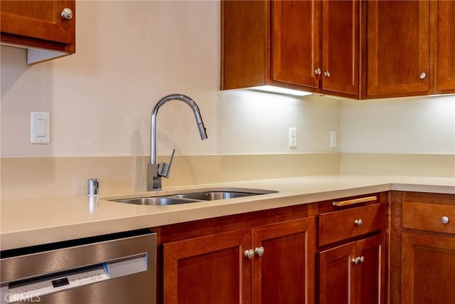 kitchen with stainless steel dishwasher and sink