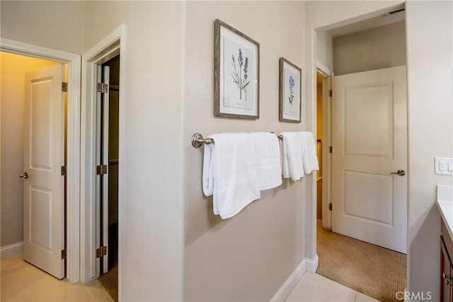 bathroom with vanity and tile patterned floors