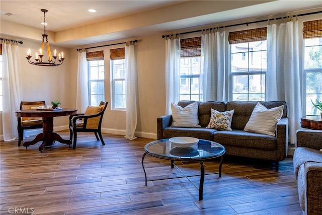 living room with a notable chandelier