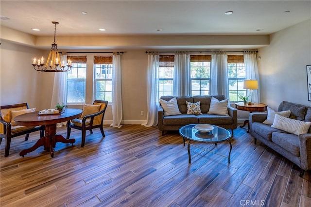 living room with a chandelier and a wealth of natural light