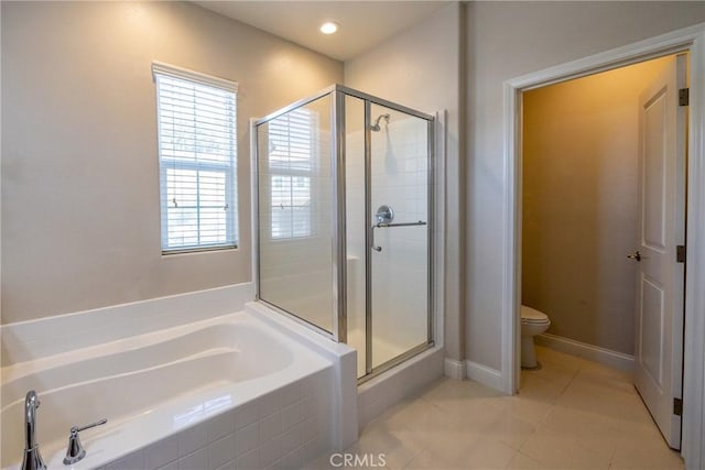 bathroom featuring toilet, independent shower and bath, and tile patterned flooring