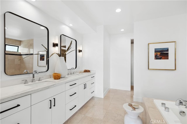 bathroom with independent shower and bath and vanity