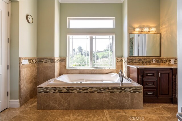805 W Road Ln, Habra Heights, CA 90631 - bathroom featuring vanity, a bath, marble look tiles, and crown molding