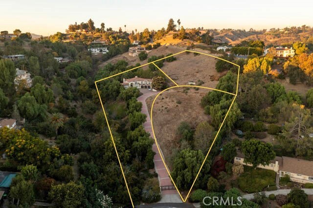 805 W Road Ln, Habra Heights, CA 90631 - aerial view at dusk of property parcel outlined