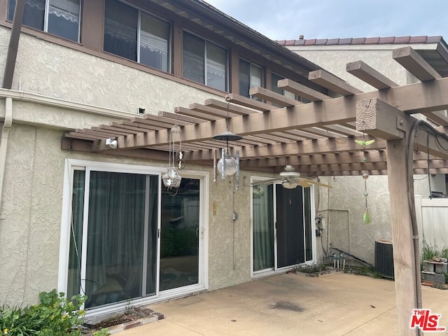 exterior space featuring a pergola and central air condition unit