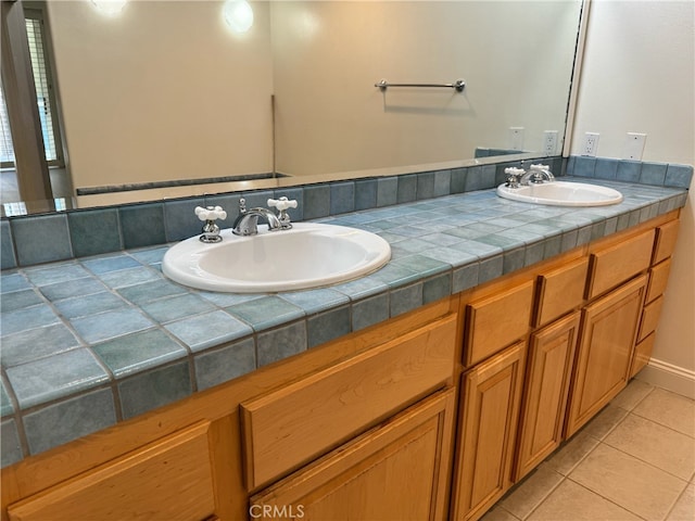 bathroom featuring vanity and tile patterned floors