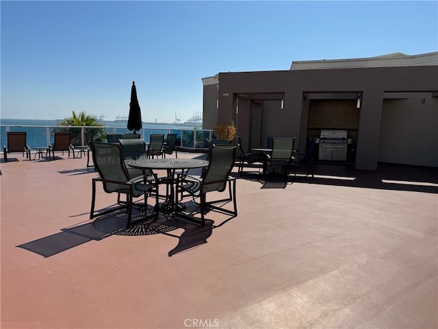 view of patio / terrace featuring a water view