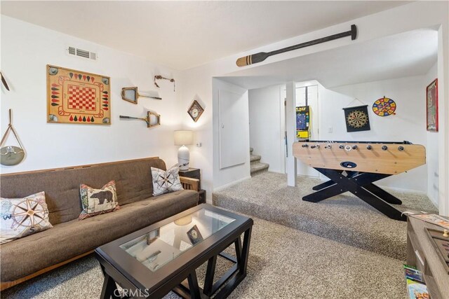30897 Glen Oak Dr, Running Springs, CA 92382 - carpeted living room featuring stairs and baseboards