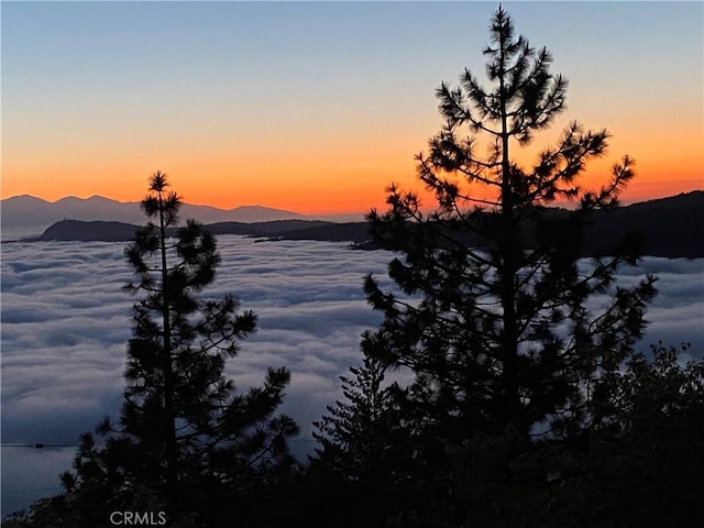 30897 Glen Oak Dr, Running Springs, CA 92382 - water view featuring a mountain backdrop