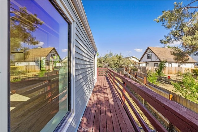 wooden deck featuring fence