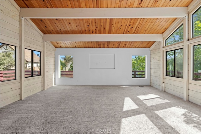 unfurnished sunroom with vaulted ceiling with beams and wood ceiling